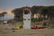 Image of a white wooden lifeguard tower on the beach
