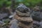 Image of wishing stones pyramid in the forest on Sakhalin island. Place of power.