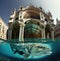 Imaginary surreal Venice over water and under water, split frame, AI generative