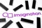 Imagination company logo on the paper document and large microchips placed around. Illustrative for electronic chip manufacturer