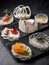An imaginative selection of 3D printed dishes that transform a meal into a luxurious tasting experience.. AI generation