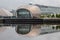 IMax Cinema Building on Front and BBC Scotland Building at the Back with Reflexion in Water