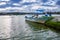 IMBABURA, ECUADOR SEPTEMBER 03, 2017: Outdoor view of a boat parket in the Yahuarcocha lake border, in a cloudy day