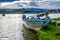 IMBABURA, ECUADOR SEPTEMBER 03, 2017: Outdoor view of a boat parket in the Yahuarcocha lake border,with other duck boat