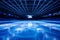 Immaculate professional hockey rink shining in bright white and intense blue spotlights