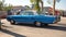 immense blue classic American car Dodge Polara.