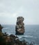 Immense rock formation with a wavy seascape view in Peniche, Portugal