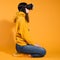 Immersion in cyberspace, virtual reality and the user. A gamer in a yellow hoodie