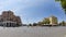 Immersive panorama in square at Ostia Lido in Rome with art nouveau palaces in a beautiful blue summer sky