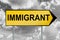 Immigrant traffic sign with black and white cloudy sky