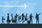 Immigration. Mini people migrate to developed countries. The concept of migration of people against the background of the Earth.