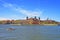 Immigration station in Ellis Island and boat in Upper Bay