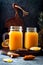 Immune boosting, anti inflammatory smoothie with orange, pineapple, turmeric. Detox morning juice drink