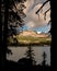 Imogene Lake Idaho with mountain peak and clouds