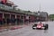 Imola, Italy 28 April 2019: a vintage Formula one car is leaving the pit lane during a rainy day