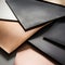 Imperfect Leather Brushed Metal: Minimalist Still Lifes In Light Bronze And Black