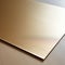 Imperfect Microfiber Brushed Metal Flat Surface: A Shiny Gold Aluminum Sheet On Wood