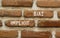 Implicit bias symbol. Concept words Implicit bias on red brown brick wall. Beautiful red brown brick wall background. Business