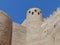 Imponing ancient boundaries with a round tower to Khiva in Uzbekistan.