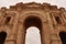 The imposing Arch of Hadrian, entrance gate to the ancient site of Gerasa, Jerash, Jordan