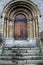 Imposing entrance of stone and marble archway of church