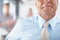 Imposing figure - Leadership. Cropped image of a senior businessman smiling and wearing a tie.