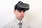 An impressed, dizzy, flabbergasted man wearing Oculus Rift VR virtual reality headset