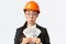 Impressed and pleased female asian construction inspector, industrial architect receiving big bribe, counting money and