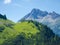 Impressing alpine scenery with wooden haut