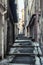 Impression of the narrow street Via Saccheri in the center of the Italian town San Remo