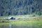 Impressionistic Style Artwork of a Ranch Tucked in the Summer Mountains