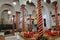 The impressive colorful interior of El Mrabet Cafe, located inside the medina, with twisted columns and a high vaulted ceiling