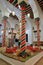 The impressive colorful interior of El Mrabet Cafe, located inside the medina, with twisted columns and a high vaulted ceiling