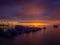 Impressive dawn on the lake. Stones in the water