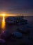 Impressive dawn on the lake. Stones in the water