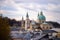 Impressive evening scenery over Salzburg: Rooftops of Cathedral, churches and houses