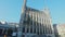 Impressive gothic building of Leuven Town Hall famous for ornate architecture on city main square on sunny summer day