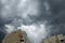 Impressive gray clouds above buildings