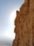 Impressive high cliff at the Masada National Park at the holy land in Israel