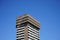 Impressive high-rise building under a clear blue sky