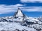 The Impressive Matterhorn Mountain with cloudy and blue Sky in Switzerland