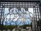 Impressive men figures on wrought iron gate with the Frogner Park in the background, Oslo, Norway