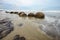 Impressive Moeraki boulders in the Pacific Ocean waves