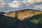 An impressive mountain range at sunset in Kuray steppe of Altai Krai