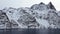 Impressive mountains of Augstvagoya near Fiskebol in the Lofoten in winter in Norway