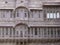 Impressive reddish latticework facade of Mehrangarh Fort in the blue city of Jodhpur, India