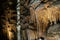 Impressive rock formations and stalactite inside underground cave