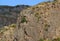 Impressive Rocky Hill with White Cross View from Geghard Monastery, Near Goght in Kotayk Province, Armenia