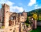 Impressive romantic medieval castle fortress with moat, tower, wall in Heidelberg, Germany