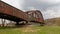 An impressive rusty railway bridge over the Weser river.